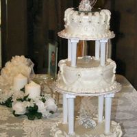 25Th Anniversary Cake 25th 3-tier anniversary cake with silver dragees, white glistening doves and silver wedding bands