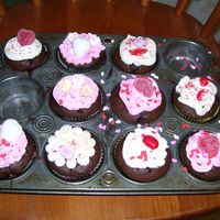 Chocolate Valentines Cupcakes Made With My Little Sister Super chocolately cupcakes iced with buttercream that my little sister and I made today accented with candies.