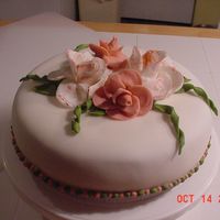 My First Fondant Cake My first fondant cake. And the first time making roses.