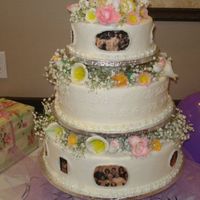 65Th Birthday This is the cake I did for one of my aunts birthday. All flowers are 50/50 with the exception of the baby's breath (real) Covered in...