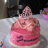 Princess Cake Pretty Pretty Princess cake. . Friends daughter cake. . First time carving a pillow. . I know, I need more work at it. . Crown is made of...