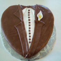 Tuxedo Groom's Cake Tuxedo cake done with chocolate fondant.