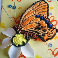 Aiko's Butterfly On A Daisy Made for an "arty" friend. Carrot cake with CC Icing & GP extras. "Antennae" are those sparkling candles (non-...