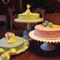 Jungle Babies three pastel baby shower cakes