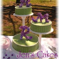 Green And Purple Made for a friend who got the idea from a magazine. Very beautiful outdoor wedding! Initials were made from floral wire, and silk flowers...