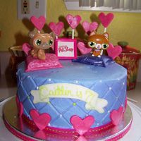 Caitlin's 7Th Birthday WASC cake, buttercream with fondant accents. This was for my niece's "Littlest Pet Shop" birthday. the animals are plastic...