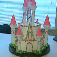 Castle Cake THIS WAS MY SECOND CASTLE CAKE I HAVE MADE AND IT CAME OUT A WHOLE LOT BETTER THAN THE FIRST ONE CONCIDERING I ONLY HAD 1 TIP TO USE TO...