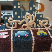 Completed City Cake This is the city cake completed. The name was made out of mmf. The cake is red velvet with vanilla bc. I had some trouble with the name - a...