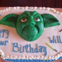 Yoda made out of rice krispy and covered in fondant