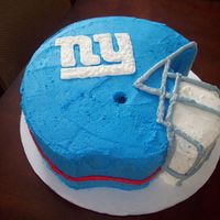 Football Helmet This is the second helment cake I did. I'm much happier with how this came out as I was able to figure out the mask. Again, I took a...