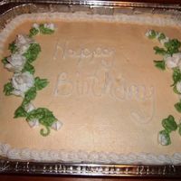 Birthday Cake For Office French Vanilla cake with butter cream icing. I colored the frosting Ivory and used white roses and used moss green for the leaves.