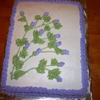 Mom's Birthday Cake 1 Chocolate cake with buttercream icing. Purple flowers. Idea came from some photos from the gallery. Thanks.