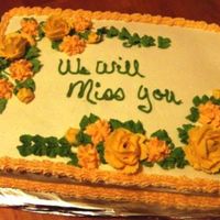 We_Will_Miss_You.jpg Cake for some one leaving our office. Cake is Cookies and cream with buttercream icing. Flowers are made with hershey kisses and butter...