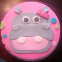 Hippo Cake double layer yellow cake iced in buttercream and details are done in fondant.
