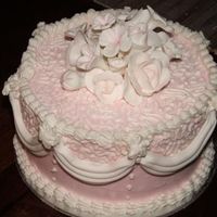 Pink Pink Pink And A Little White this is a dummy cake i used to practice a new tecnique.. the drapes.. all buttercream with fondant flowers and fondant drapes