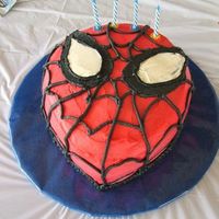 Spiderman this is my sons 4th birthday cake...big spiderman fan obviously.. the cake is 10" round cut to shape freehand , double with strawberry...