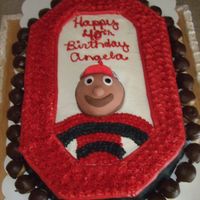 Brutus Buckeye Cake For my Ohio State loving sister's 40th birthday. Cake surrounded by peanut butter buckeyes, Brutus head is fondant.