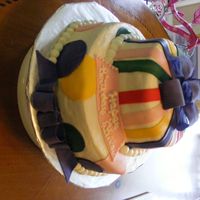 Primary Stripes This was for an Elmo birthday, and I made a fondant Elmo topper for it but forgot to take a picture of it with the topper on it :(...