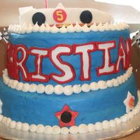 Speed Racer Cake Made this for a friend. All edible fondant car on top. My first car. She showed me picture she liked and I did my best to replicate it.