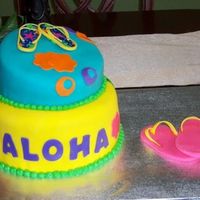 Aloha Graduation Cake This is one of two cakes made for a Hawaiian themed graduation party. White cakes with buttercream icing and covered in fondant. The pink...