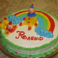 Clown Cake this one was a nightmare. supposed to be my husbands cake looks more like my sons. cake didnt rise. filling got eaten before i got to fill...