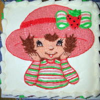 Strawberry Shortcake This is a 10" marble strawberry and chocolate cake with vanilla filling, covered in BC. The caracter is piped BC. Very simple, but...
