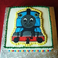 Thomas Train Engine This is a 10" square marble chocolate and vanilla cake with mixed berries filling. I made Thomas the Train Engine using the frozen...
