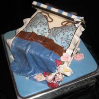 Lingerie Shower 8" Carrot cake,cream cheese filling covered in MMF, gumpaste flowers, box cover cardboard covered with MMF.