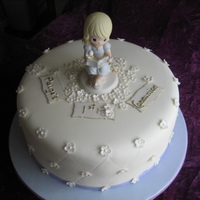 Communion Cake For A Girl Simple white cake with 'Precious Moments' topper, lustre flowers, MMF, 3 layer carrot cake with cream cheese filling