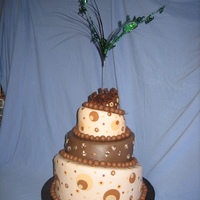 30Th Birthday Topsy Turvy Cake chocolate themed cake surrounded by malteses chocolates