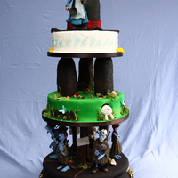 Terry Pratchett Fans This wedding cake os based on one of Terry Pratchett's novels, The Wee Free Men. The bridal couple are big fans of his works. The main...