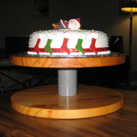 Baby Santa Christmas Cake Fondant covered cake, sugar paste santa, stockings, robins and sugar bells