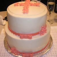 Sophie's Baptism This is a baptism cake for my daughter. Frosted in buttercream with fondant ribbon and gumpaste flowers. It's hard to see, but the top...
