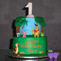 Winnie The Pooh This cake was for a friend's son who was turning one. I got the idea for this cake off this site. WASC cake with bavarian cream...