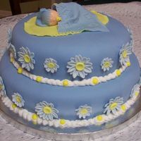Baby Shower Cake Baby shower cake. Fondant decor. This was my first attempt at molding something from fondant. I got the idea for the sleeping baby from...