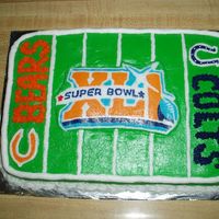 Superbowl Xli Cake Red velvet cake, (green) cream cheese icing, BC decorations. The logos are FBCTs.