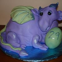 Martin's Dragon This is a dragon cake I made for my brother's 29th birthday. He's carved out of cake, covered with fondant, and detailed with...