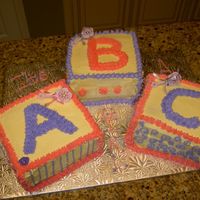 Baby Girl Cake 1st Baby shower cake- block cake, idea from this website. Placed blocks a little too close together, made it hard to decorate middle block...