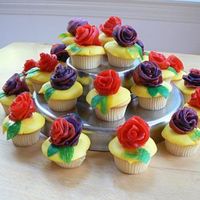 Flower Cupcakes I made these cupcakes for my daughters class for her 5th birthday. These are mini cupcakes decorated with roses and leaves made of fruit...