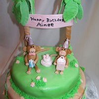 Monkeying Around gumpaste monkeys, pretzel trees with gumpaste wrapped around.