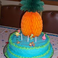 Spongebob_Cake.jpg This is a spongebob cake I made for my daughter's 3rd birthday.It was a yellow cake w/ buttercream icing. The pineapple was from a...