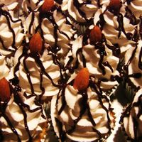 Cupcakes For Friend's Wedding Shower I'm totally new to this, and would appreciate any feedback. Almond cupcakes with chocolate ganache center, and BC frosting. I love how...