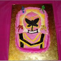 Pink Power Ranger Sheet cake with Buttercream icing. I drew the Power Ranger by hand then decorated.