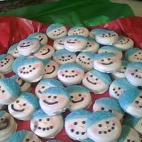 Snowmen Cookies oreo cookies dipped in white choco. thanks sugarshack.