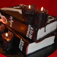 Twilight/new Moon Books W/edible Candles The 1st 2 in the Twilight Saga. The books are red velvet cake with cream cheese frosting and the candles are red velvet cake wrapped with...