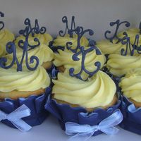 Bridal Cupcakes Cupcakes for a friends bridal shower with her and her fiance's initials in blue candy melts on top.