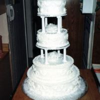 3_Tier_R.jpg I made this for my cousin's son. White cake. White crisco frosting and RI primroses