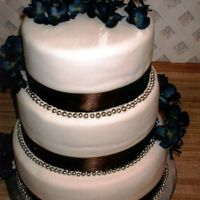 Hydrangea Wedding Cake This was for a very nice couple. It is double chocolate fudge with a whipped chocolate ganache filling covered in fondant. I loved the...