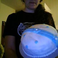 Picture0001.jpg a classic vanilla cake covered in fondant with fonday accents