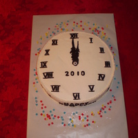 New Years Eve 2009 Made this for New Years Eve party. Cake is french vanilla with vanilla bc icing and fondant accents Time consuming but fun to do. Everyone...